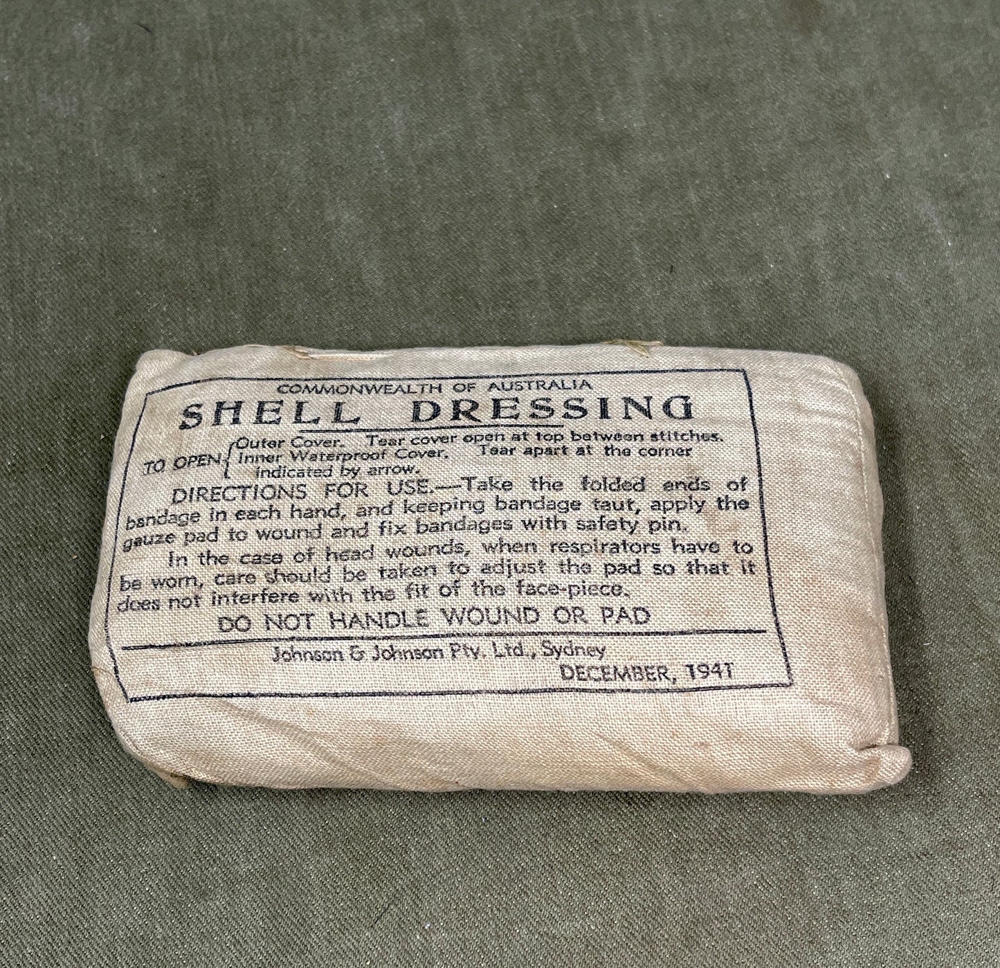 Shell dressing package with text on a gray background