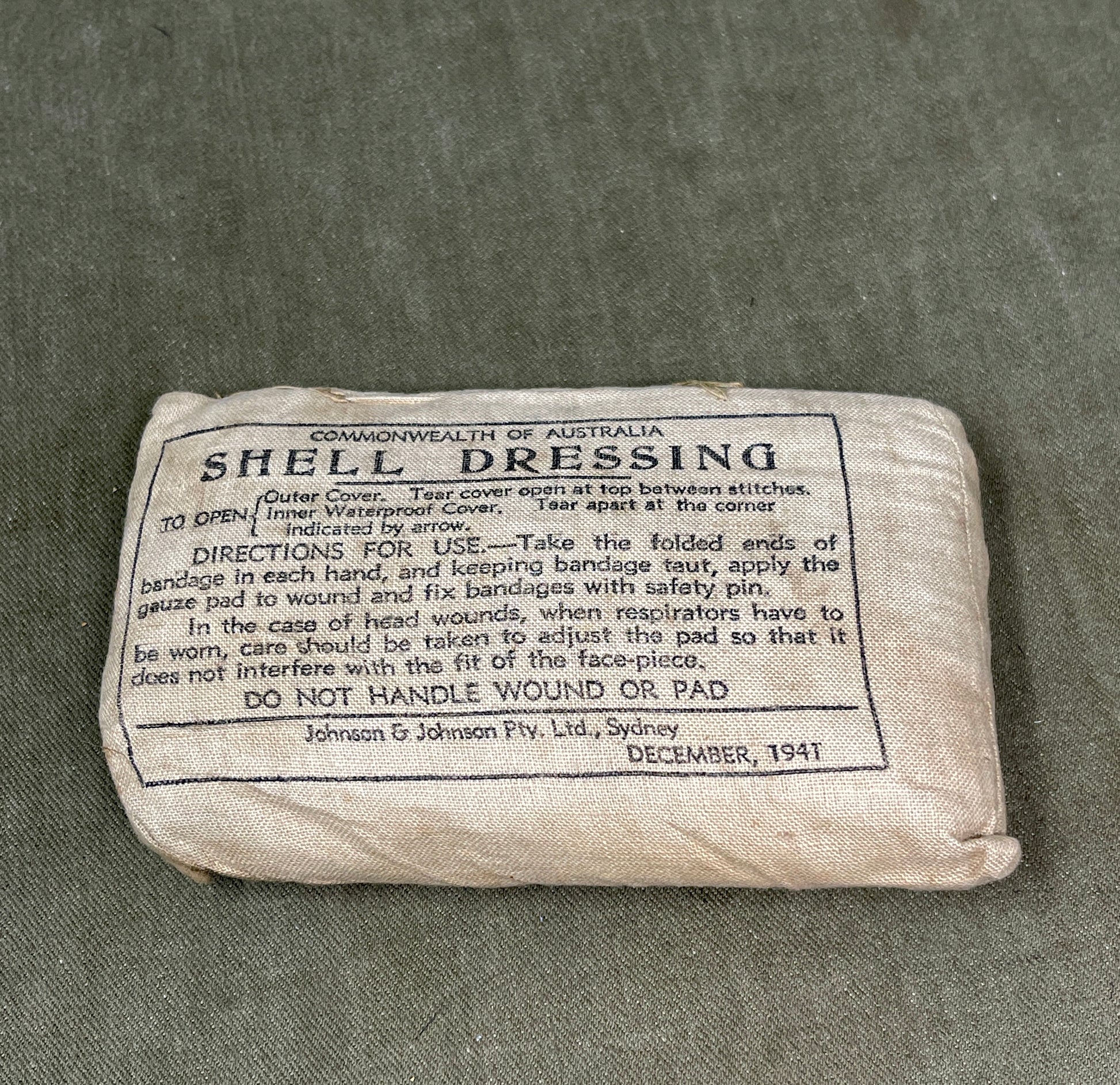 Shell dressing package with text on a gray background