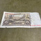 Vintage German Reichsbanknote banknote on a textured surface