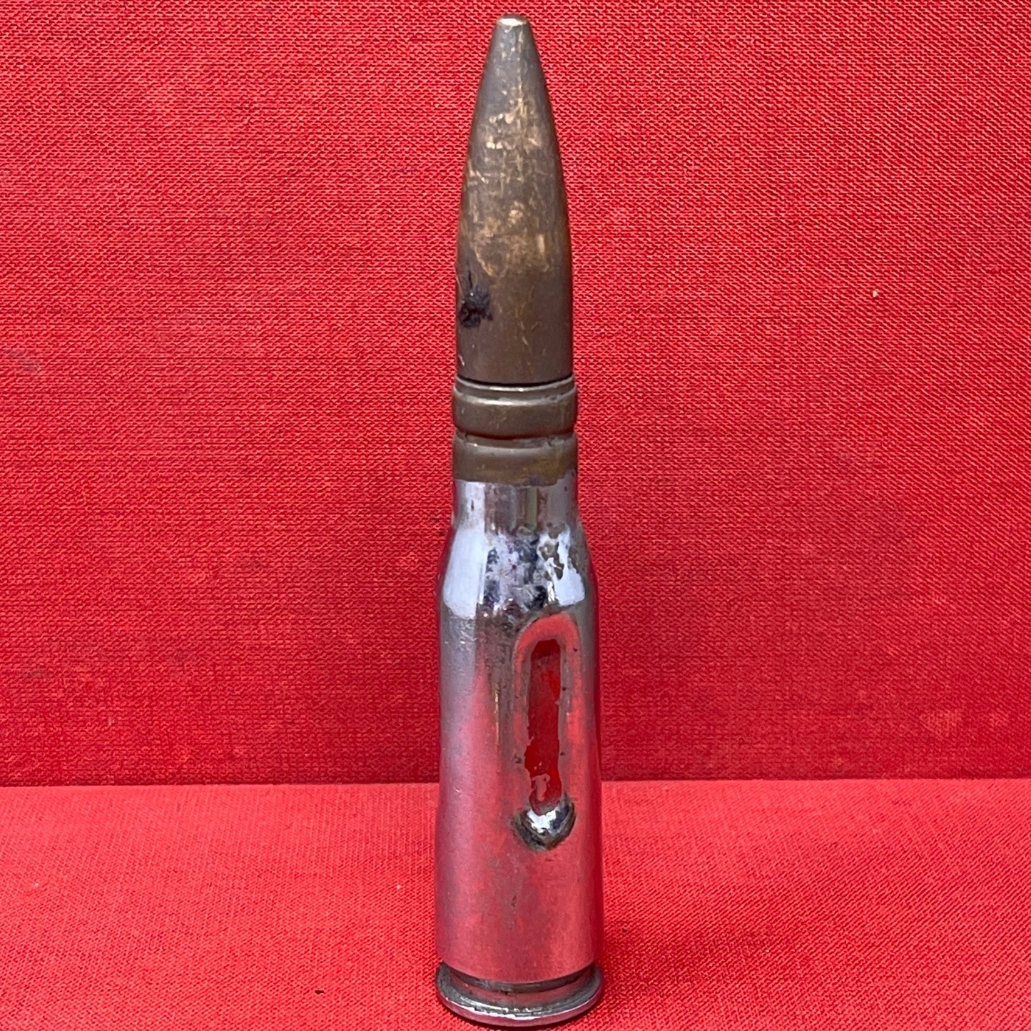 A British Drill .50 Cal Spotter round for 120mm Wombat