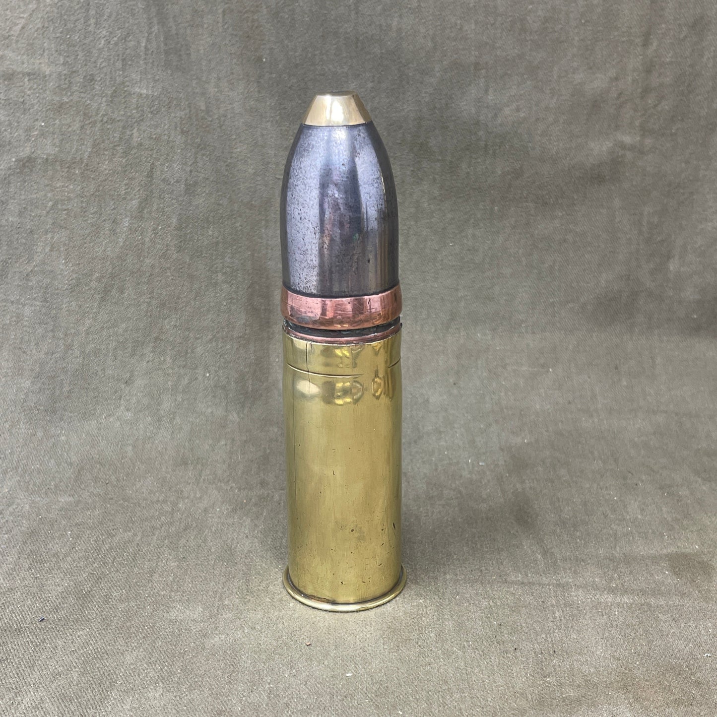 An inert Vickers Sons & Maxim 37 mm projectile and case