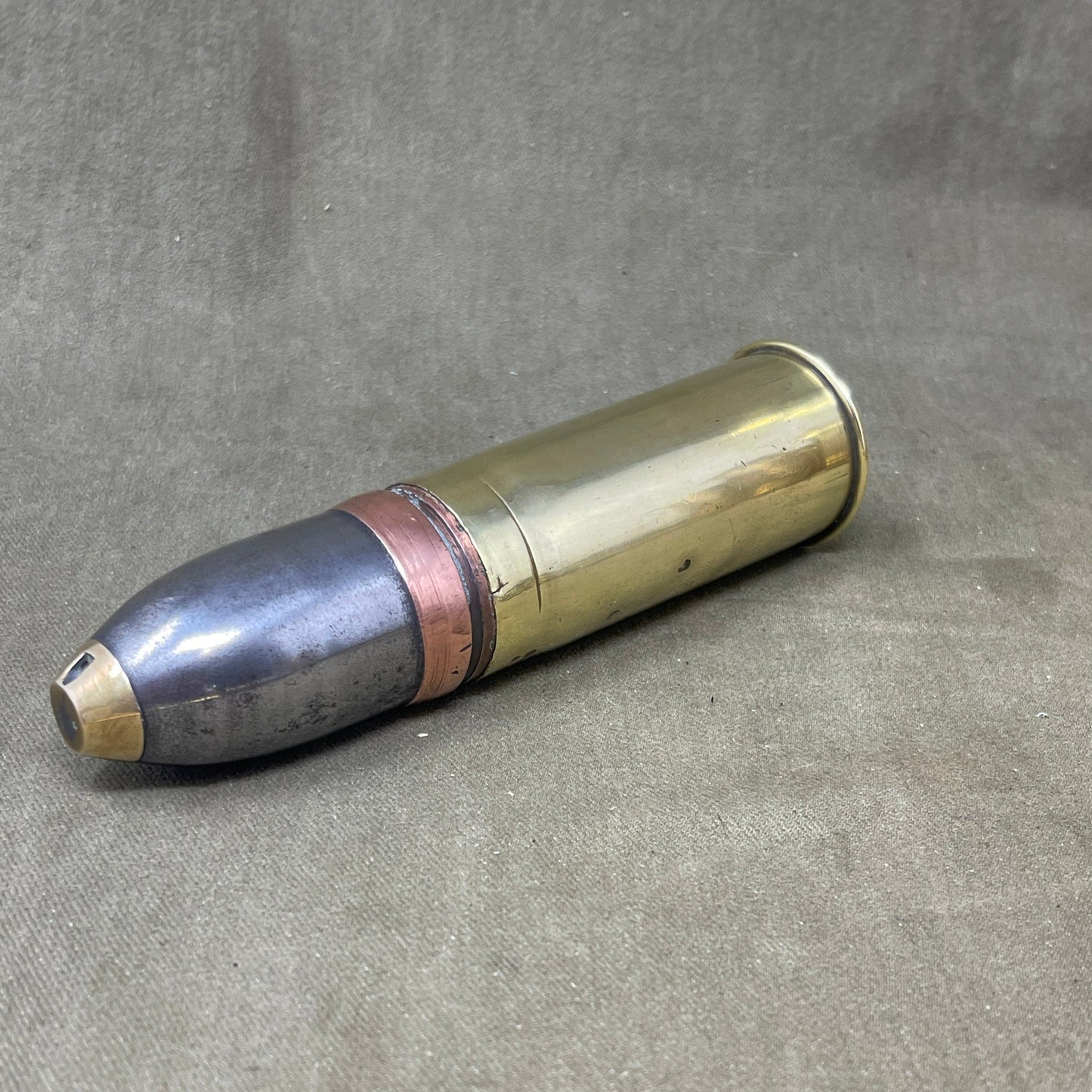 An inert Vickers Sons & Maxim 37 mm projectile and case