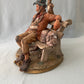 Capodimonte Tramp on Bench Figurine by Volta