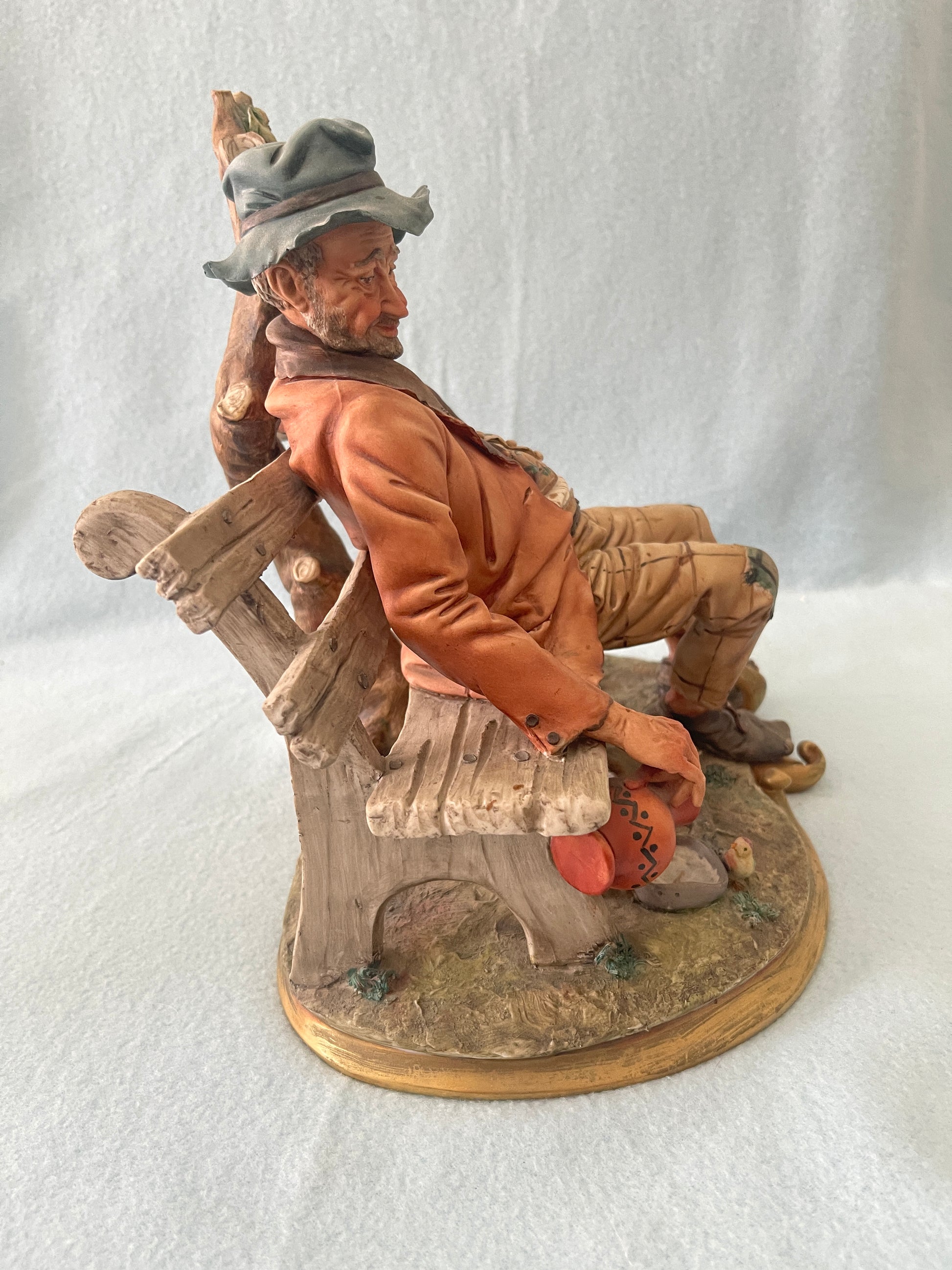 Capodimonte Tramp on Bench Figurine by Volta