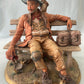 Capodimonte Tramp on Bench Figurine by Volta