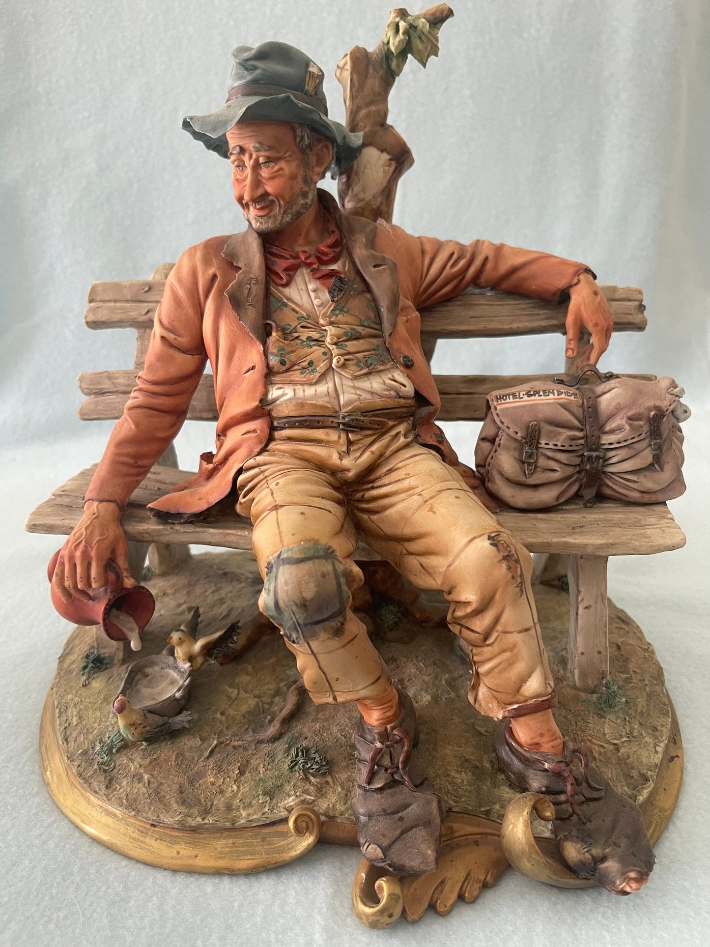 Capodimonte Tramp on Bench Figurine by Volta