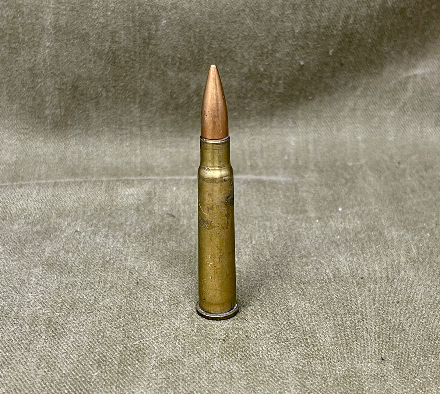 Bullet on a textured gray background