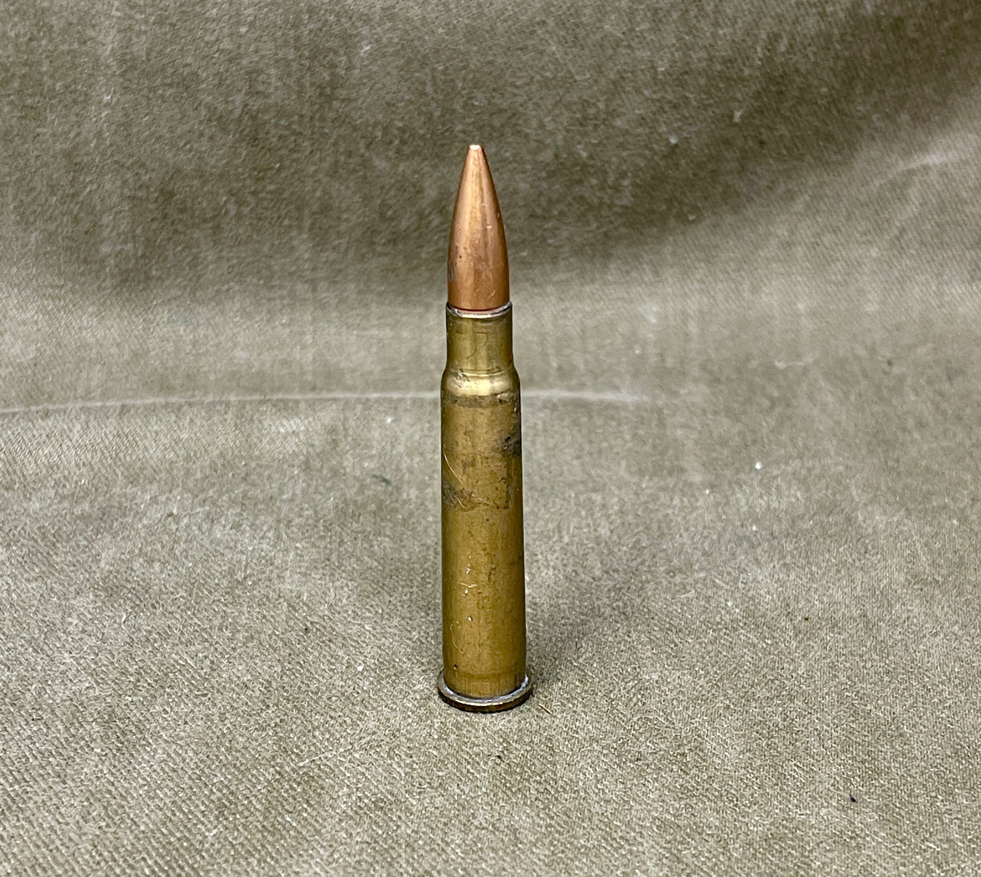 Bullet on a textured gray background