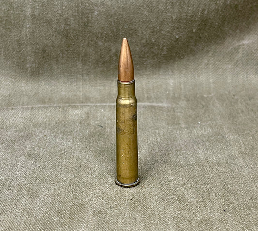 Bullet on a textured gray background