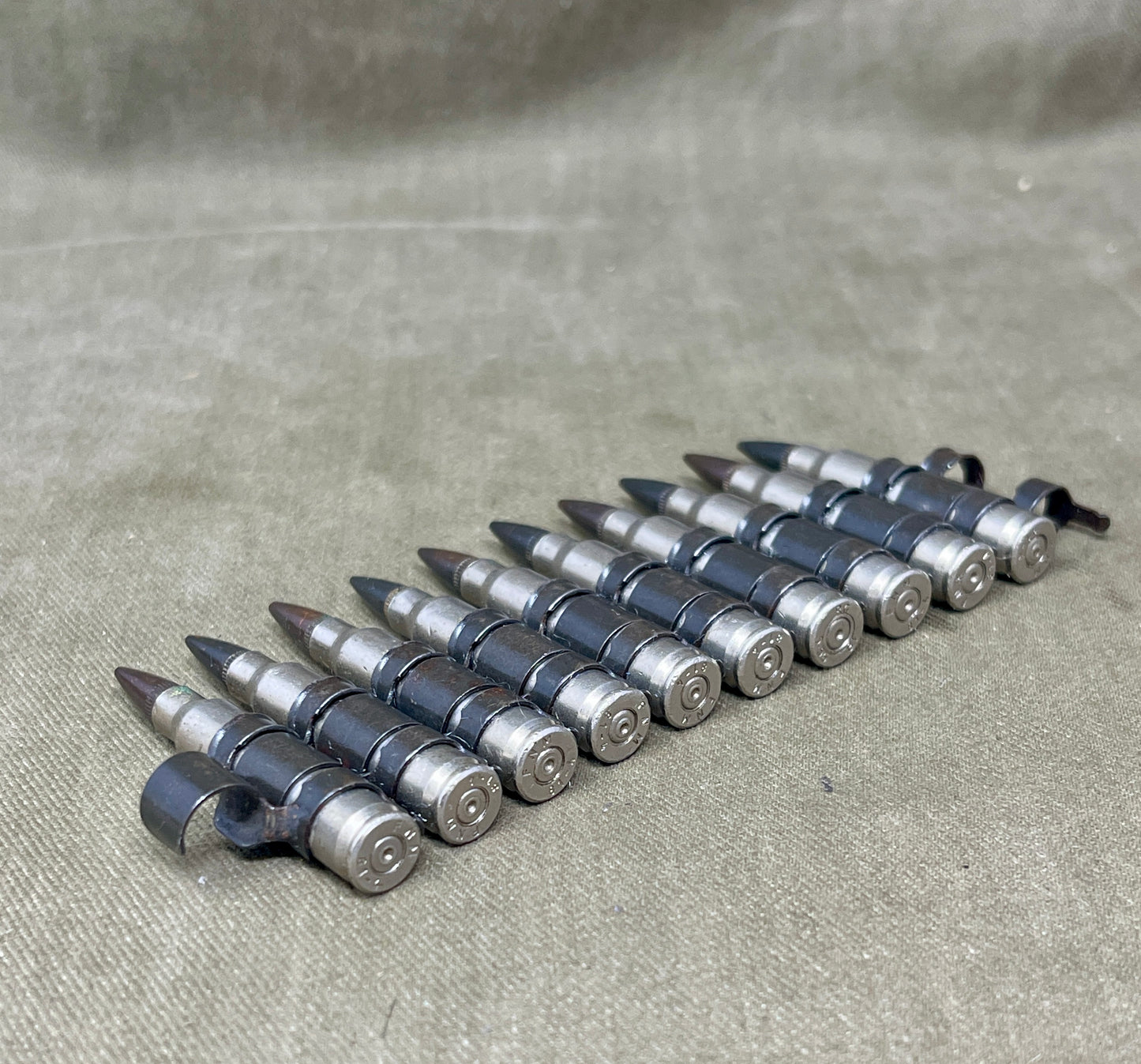 M249 LMG 5.56mm Nickel‑Plated INERT Belt of 10 | Display Ammunition