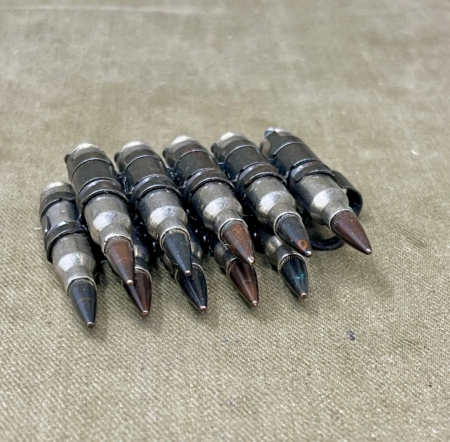 M249 LMG 5.56mm Nickel‑Plated INERT Belt of 10 | Display Ammunition