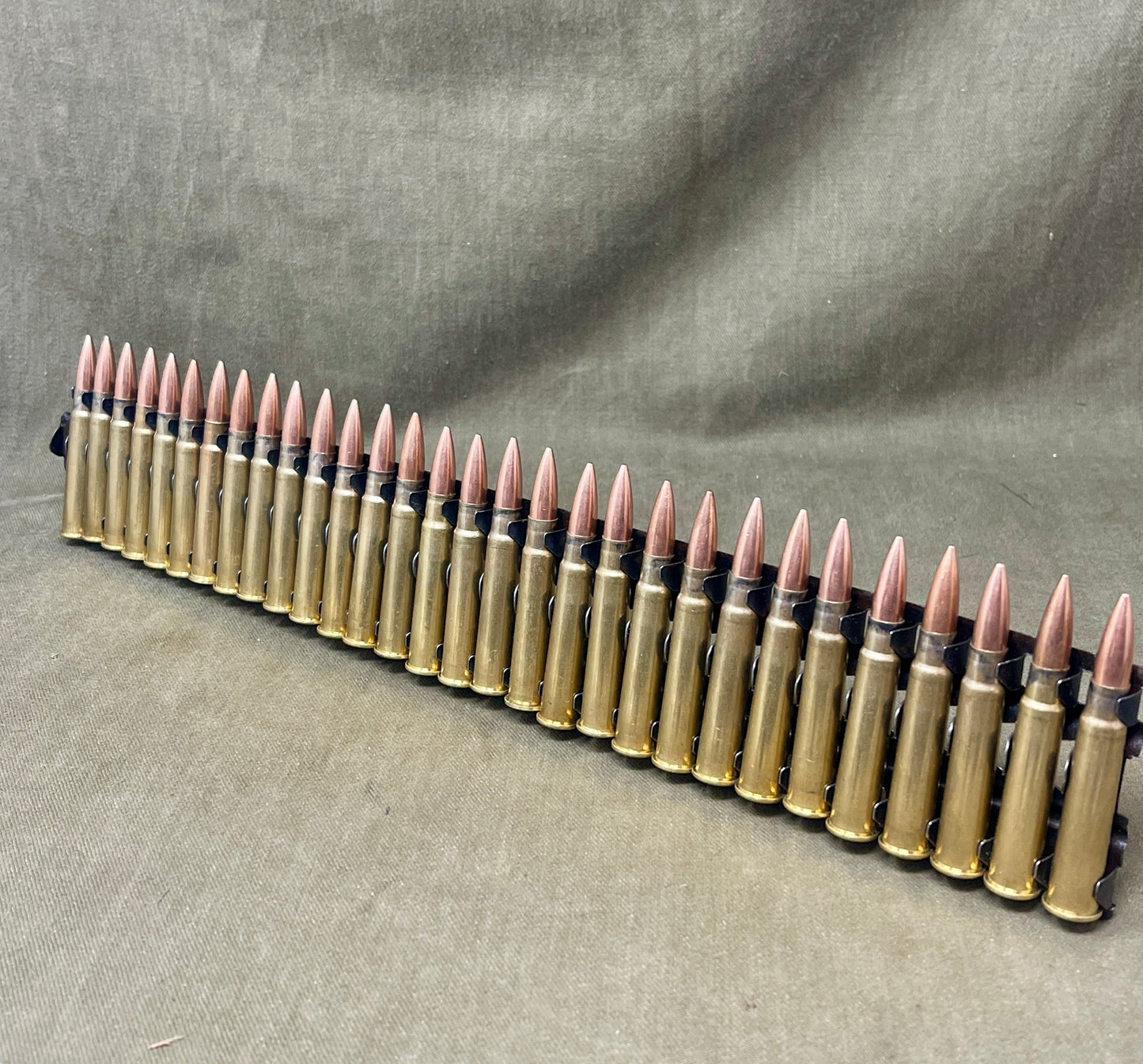 30 × Inert .303 British Rounds Fitted to 30‑Round Hotchkiss Magazine Strip