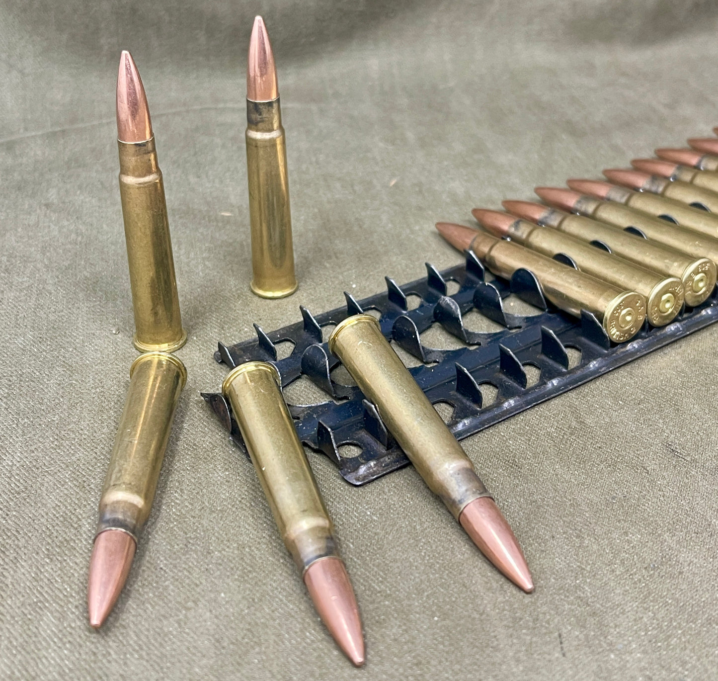 30 × Inert .303 British Rounds Fitted to 30‑Round Hotchkiss Magazine Strip