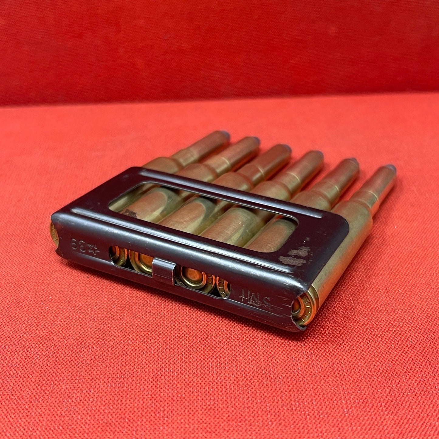 6 x 6.5mm Carcano rounds in clip (inert) (4) (M2)