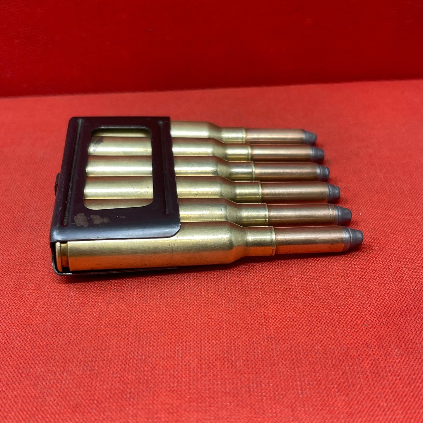 6 x 6.5mm Carcano rounds in clip (inert) (4) (M2)