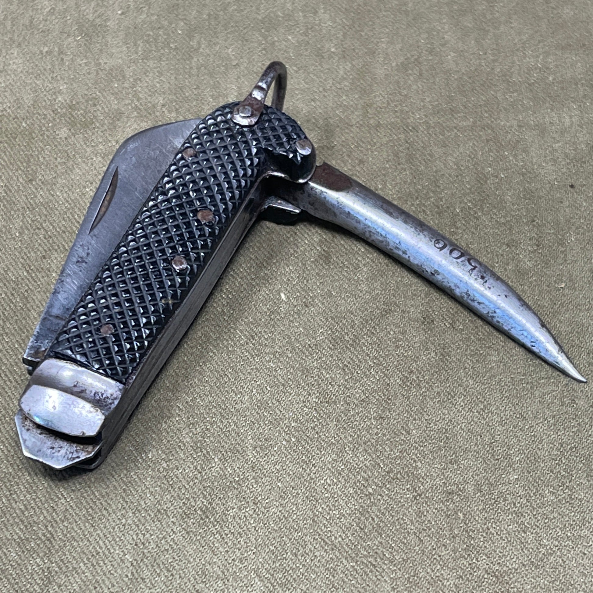 A nice example of a British 1943 Dated Pocket Jack Knife made by Humphreys Radiant of Sheffield  The blades are in good condition, the chequered Bakelite grip is intact and all the blades lock and close as they should. The steel can opener is in good condition