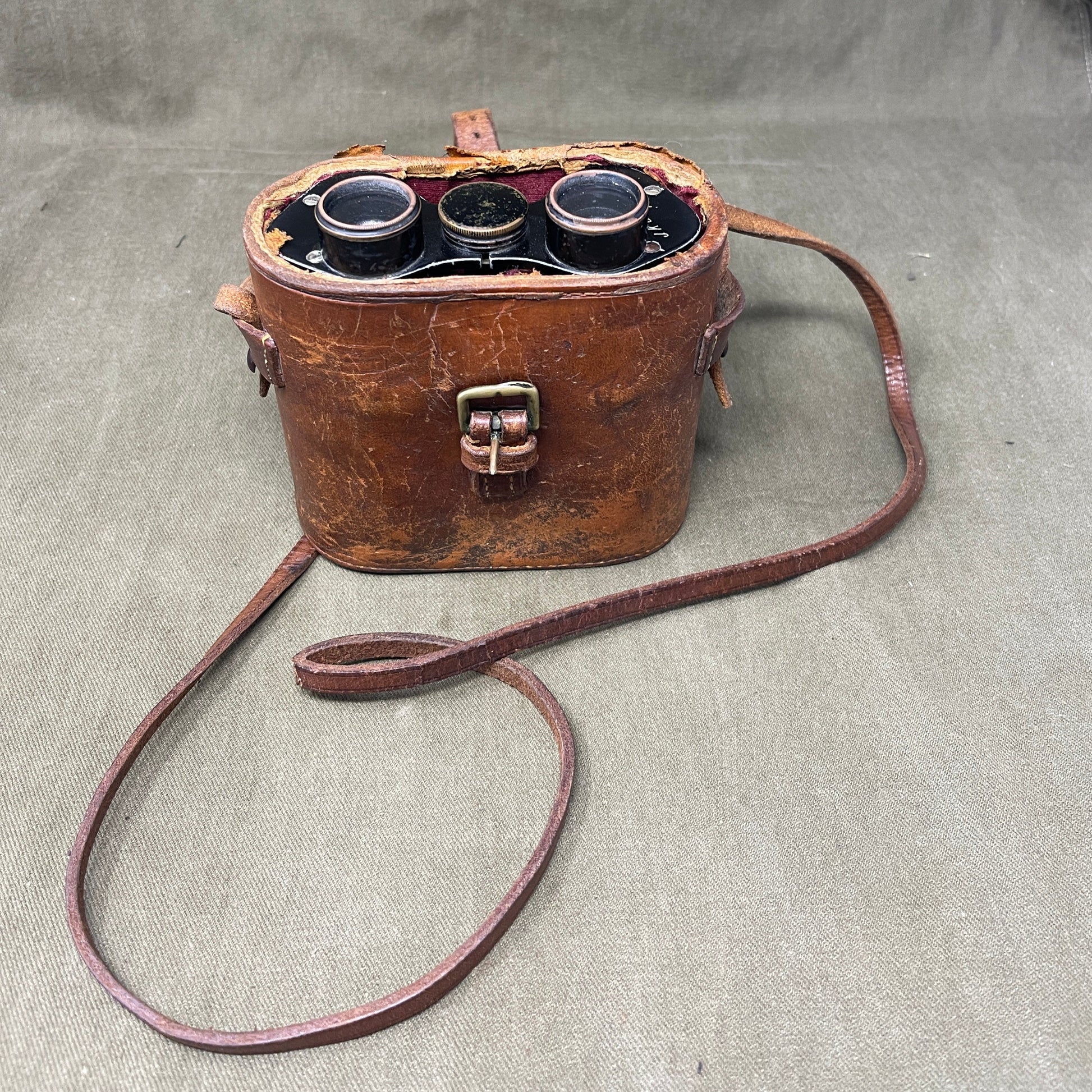 A WW1 set of binoculars made by Zeeda Paris  Named to J.K Connal 7th R.S.F.