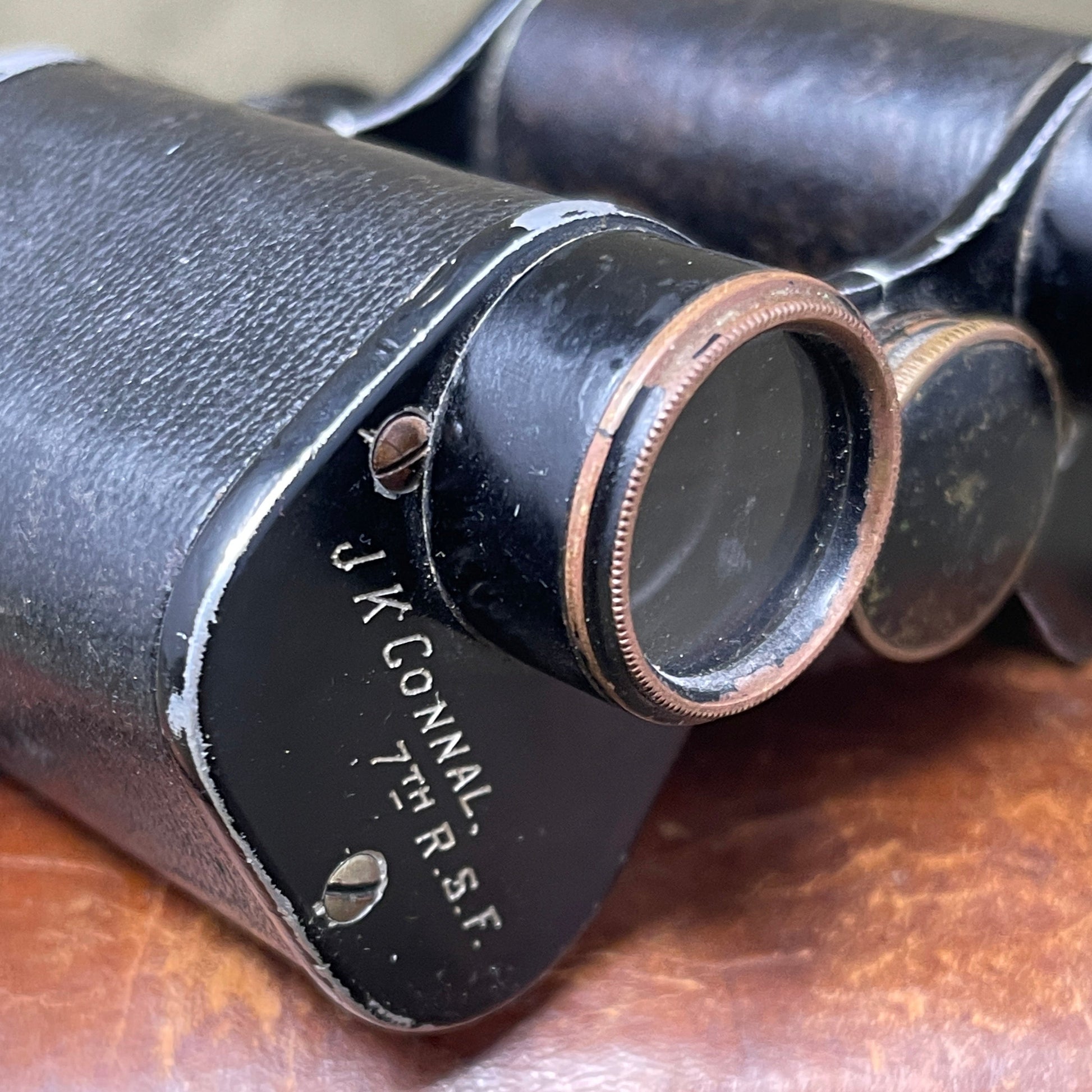 A WW1 set of binoculars made by Zeeda Paris  Named to J.K Connal 7th R.S.F.