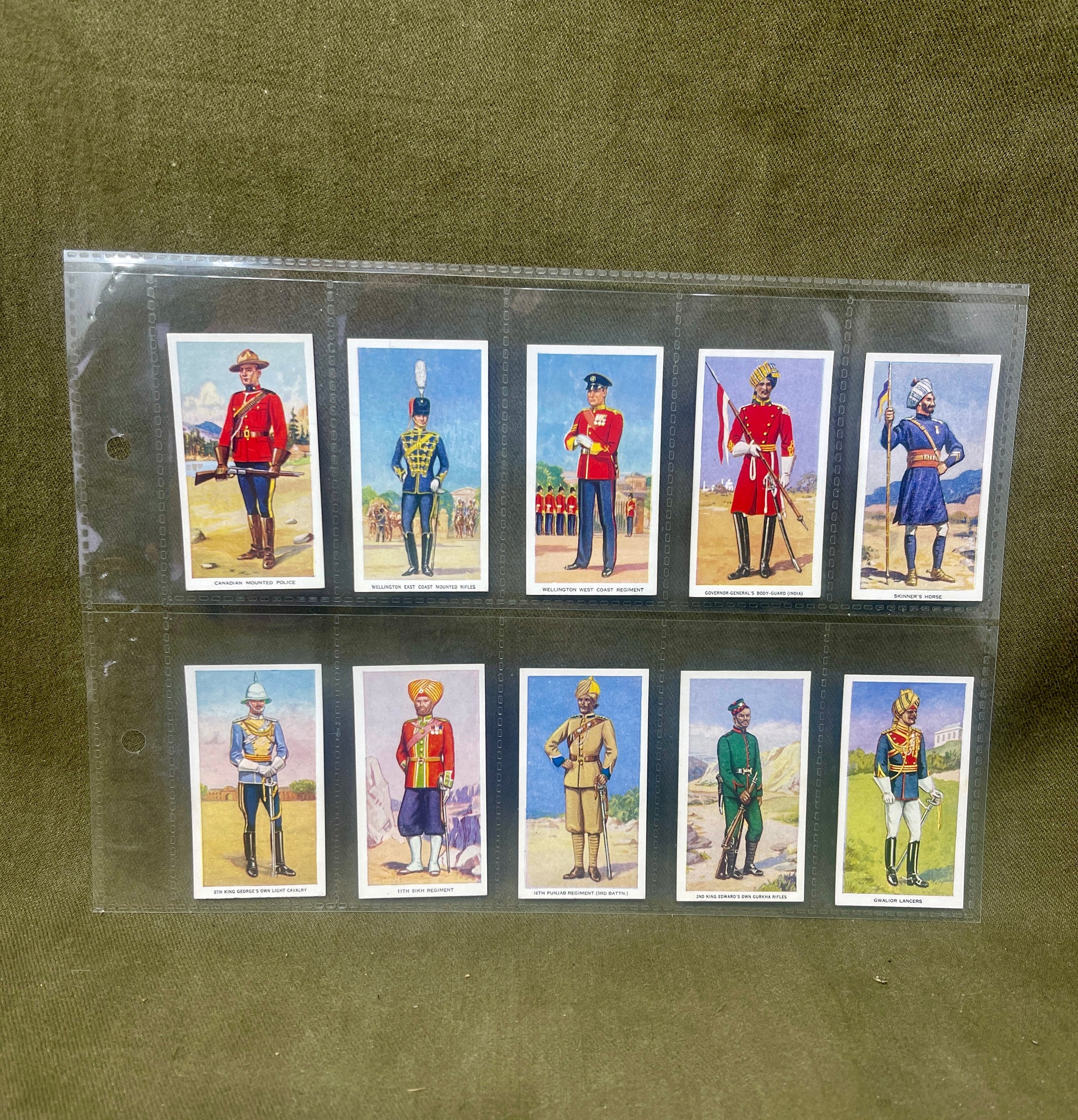 "Explore the Godfrey Phillips Ltd 'Soldiers of the King' cigarette cards, showcasing stunning illustrations and historical insights into British Army regiments. A valuable collectible for military history enthusiasts."