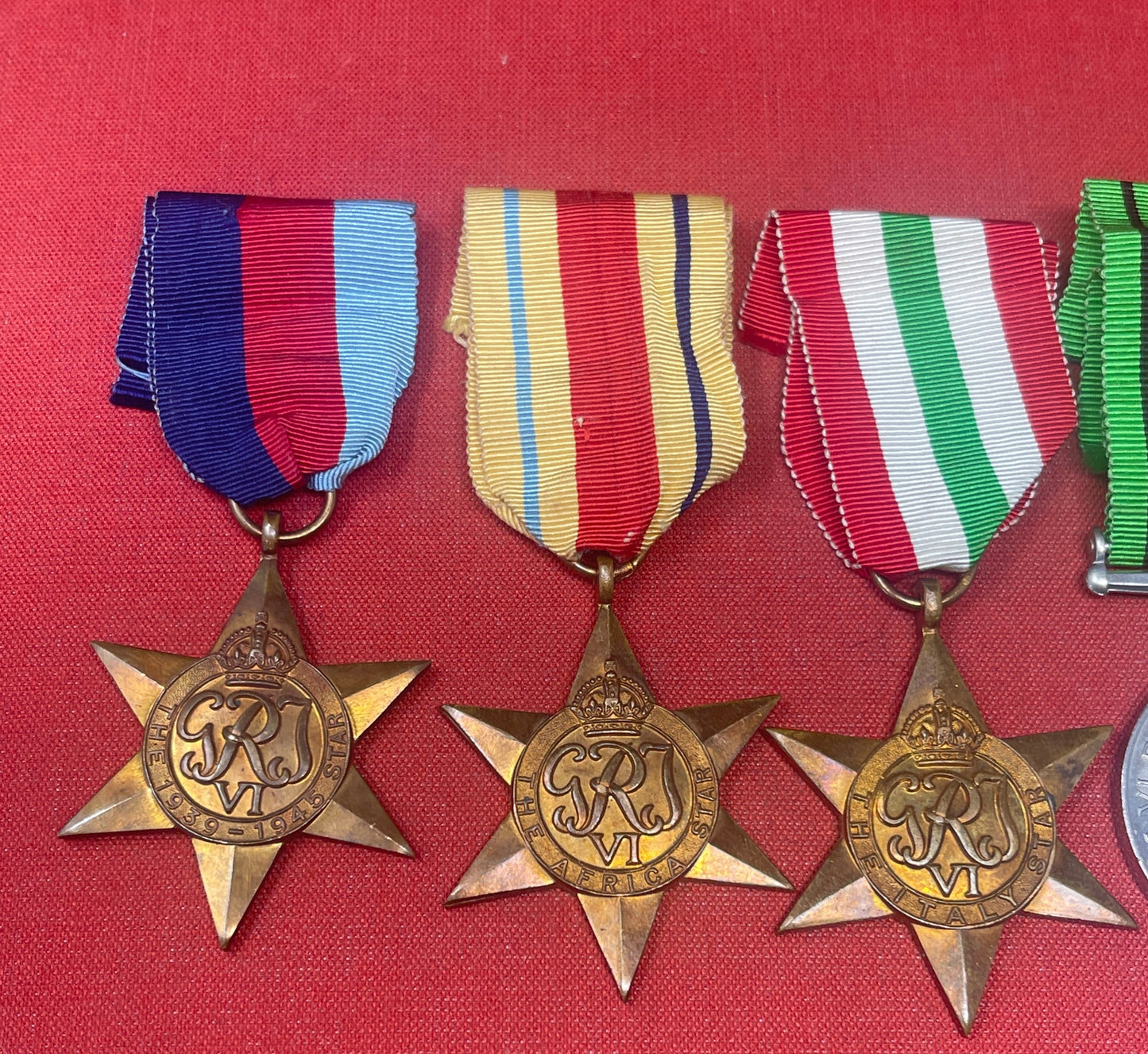 The British 1939-45 Star, the Defence Medal, and the various campaign stars are military decorations awarded to members of the British and Commonwealth armed forces for their service during World War II. Each medal and star had specific eligibility criteria and was awarded for different types of service.