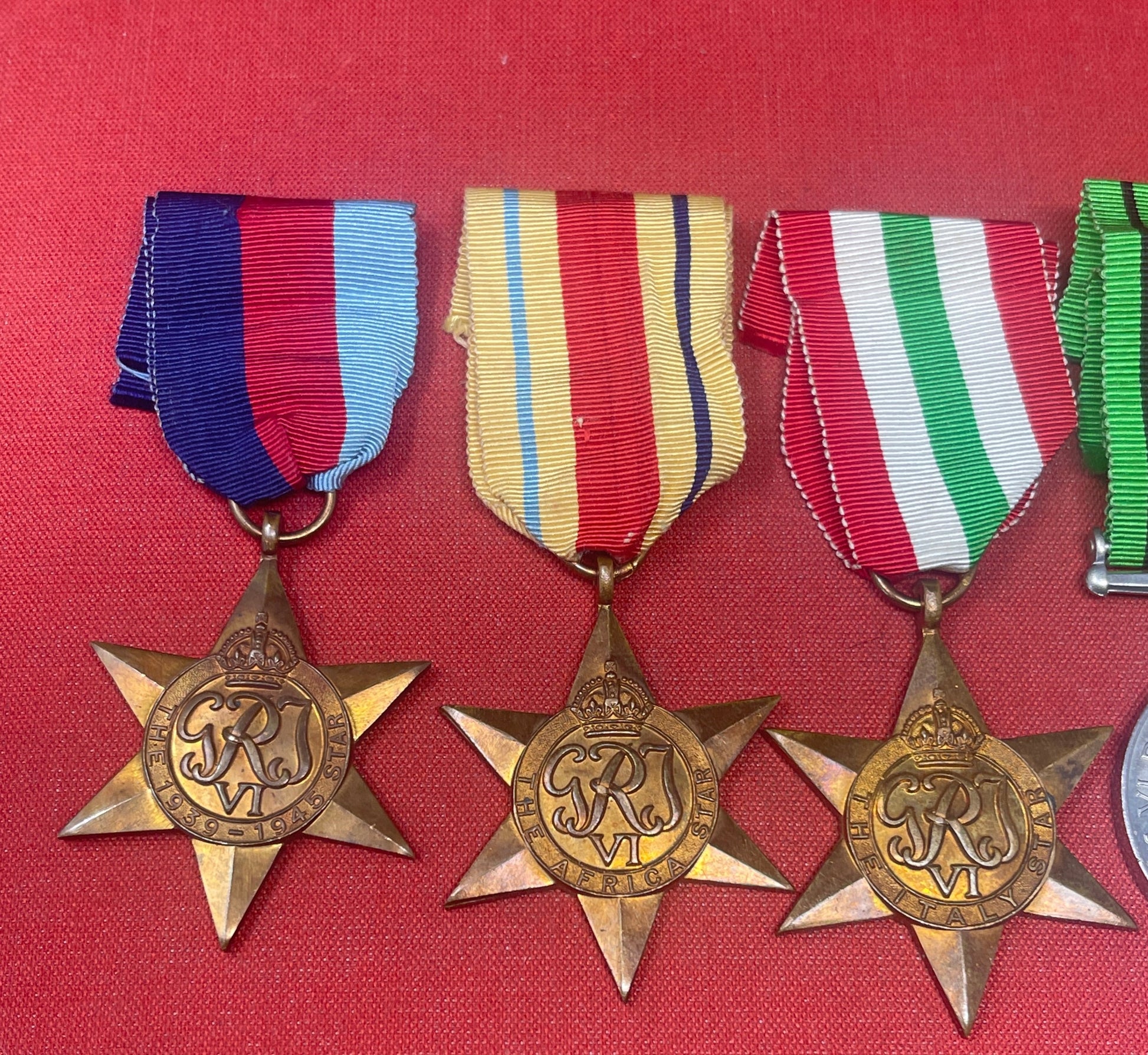 The British 1939-45 Star, the Defence Medal, and the various campaign stars are military decorations awarded to members of the British and Commonwealth armed forces for their service during World War II. Each medal and star had specific eligibility criteria and was awarded for different types of service.