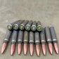 The 50 Cal cartridge cases stamped "FNB 22" refer to .50 caliber BMG (Browning Machine Gun) cartridge cases manufactured in 2022 by Fabrique Nationale de Herstal (FN Herstal), a prominent arms manufacturer in Belgium. The .50 BMG is a powerful, high-velocity round originally developed in the early 20th century for the Browning M2 heavy machine gun but is now widely used in various military, law enforcement, and civilian applications, particularly for long-range precision shooting, anti-material rifles, and 