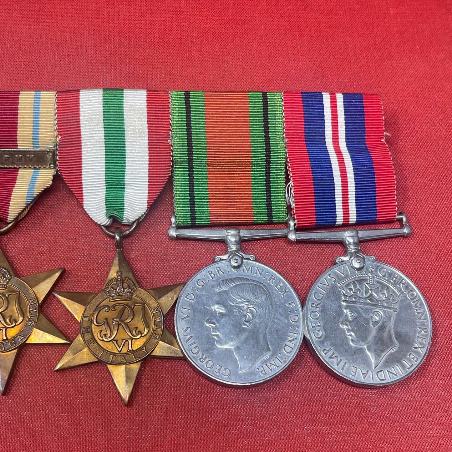 A WWII Medal Group Defence Medal, War Medal, Italy, Africa and 1939-45 Star 