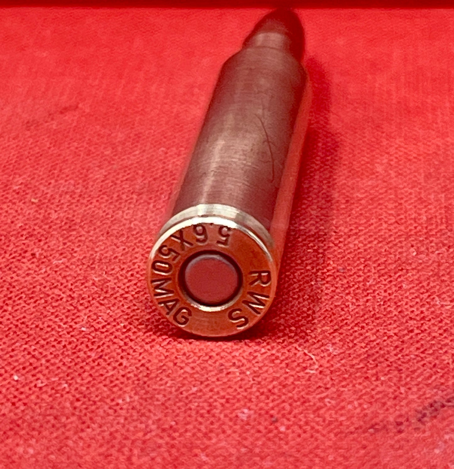 Discover a rare RWS 5.6 x 50 Mag inert round, a unique collectible piece of hunting ammunition history. Perfect for collectors and enthusiasts of vintage cartridges.