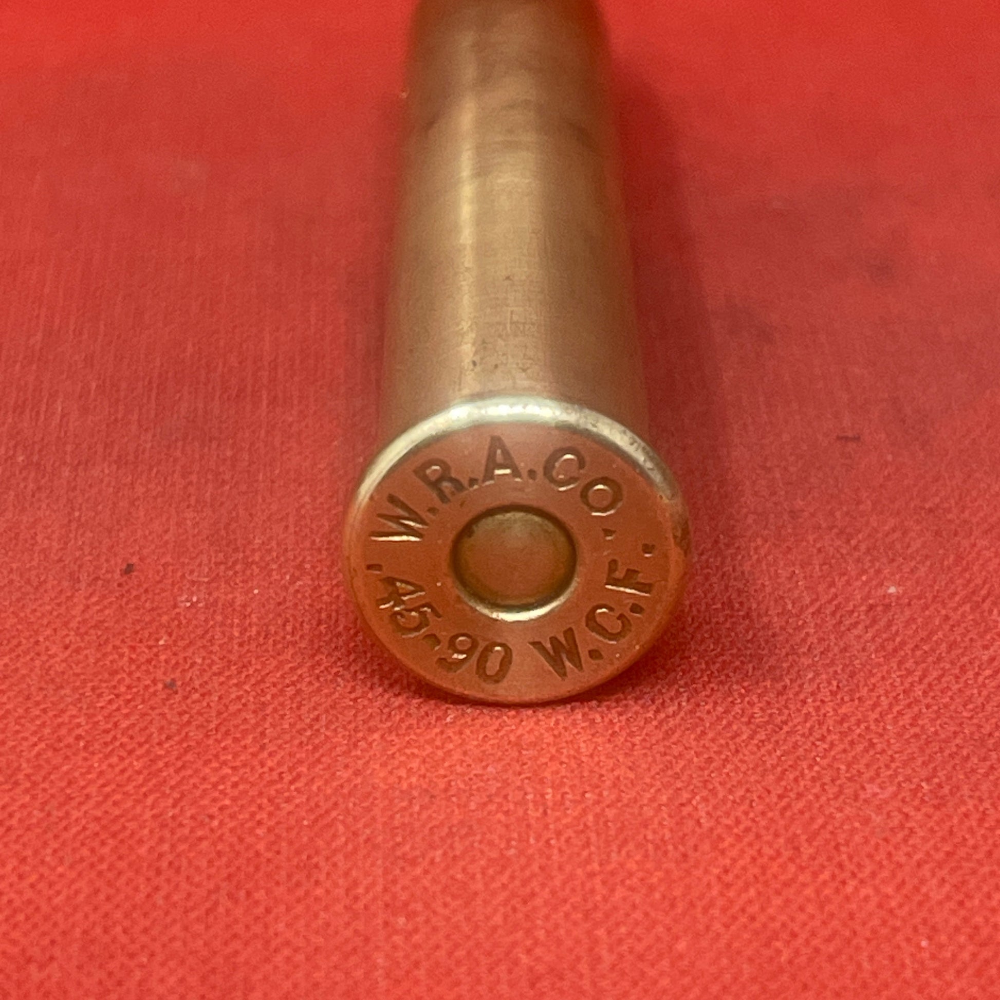 
"Original WRACO .45-90 WCF inert cartridge from the late 19th century.