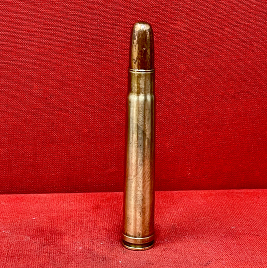 "Explore the INERT H&H .375 Magnum W-W Super Cartridge, a deactivated collectible showcasing big game hunting history and exceptional craftsmanship."