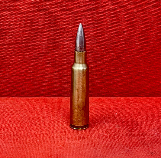 "Discover the INERT REM-UMC .260 HR round, a deactivated collectible showcasing early American ammunition craftsmanship and the legacy of the Union Metallic Cartridge Company."
