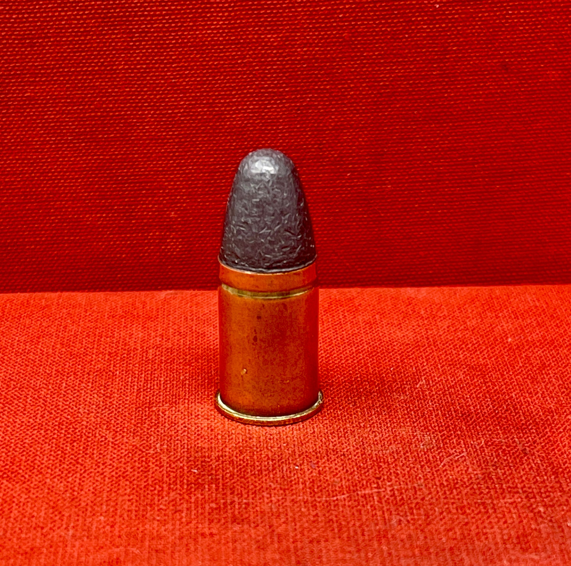 The .455 INERT British Wartime Round with the E C II headstamp is a highly detailed, safe-to-handle replica of a historical cartridge used during the early 20th century. This inert round is a non-functional reproduction, meaning it contains no live components such as primer, powder, or projectile, making it ideal for collectors, educators, or firearm enthusiasts who wish to study or display wartime ammunition without risk.

The .455 cartridge was widely used in both World Wars, particularly in revolvers lik