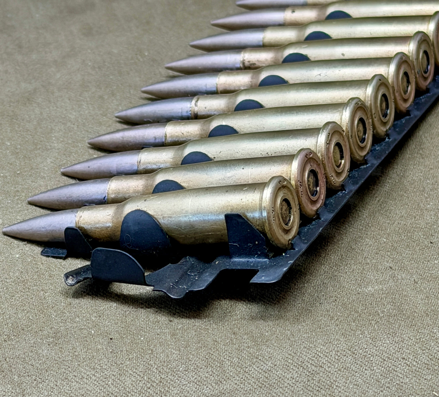 30 × Inert French 8×50mmR Lebel 1948 Rounds on Original 30-Round Hotchkiss Strip – Oil Injected Display Set