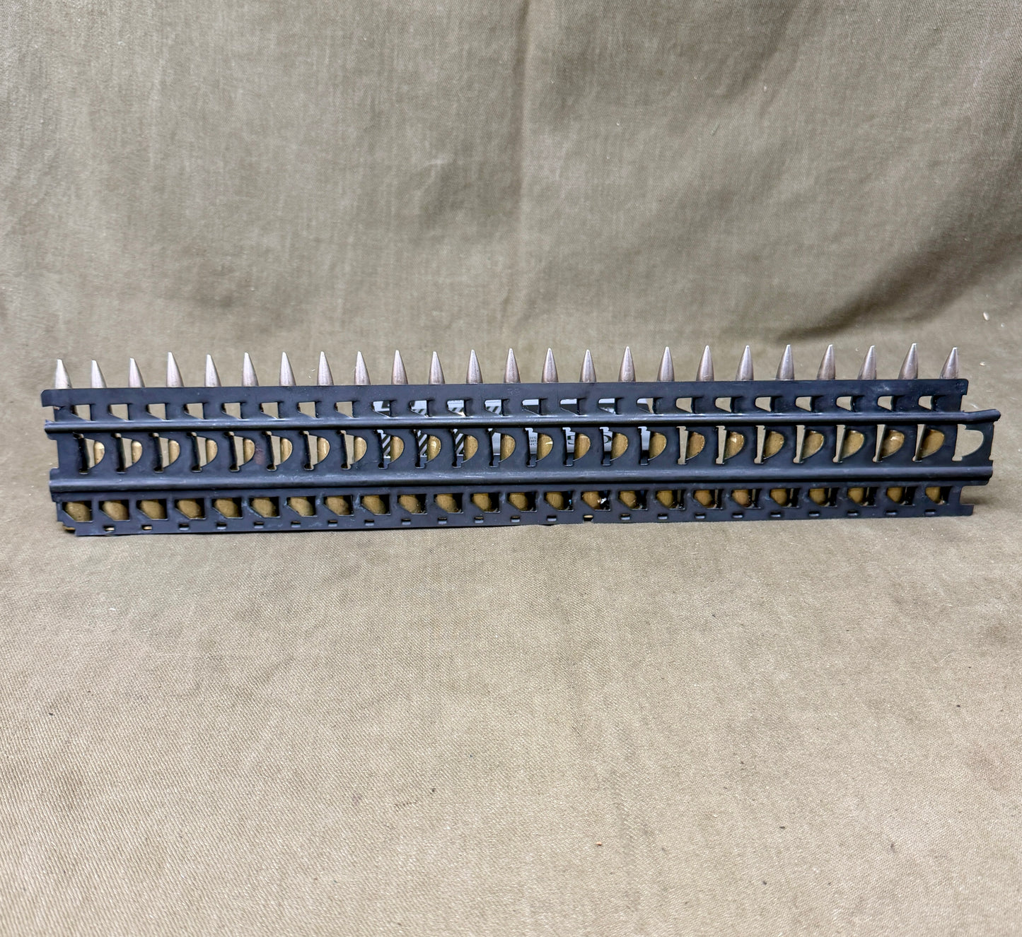 30 × Inert French 8×50mmR Lebel 1948 Rounds on Original 30-Round Hotchkiss Strip – Oil Injected Display Set