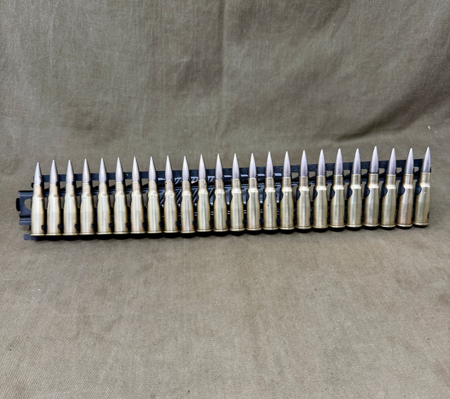 30 × Inert French 8×50mmR Lebel 1948 Rounds on Original 30-Round Hotchkiss Strip – Oil Injected Display Set