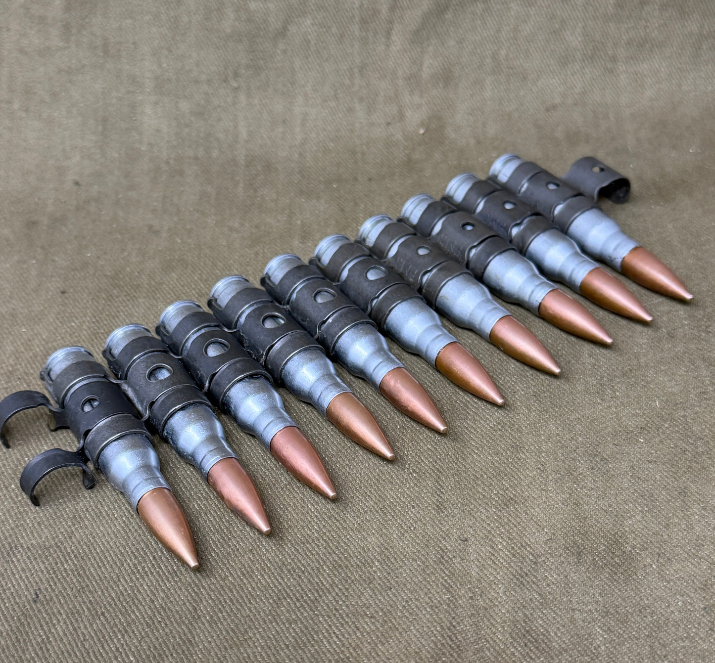 10 x 7.62mm British Military Drill Rounds in GPMG Link Belt – Inert Training Display Set