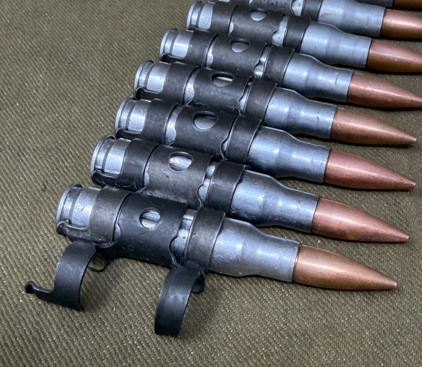 10 x 7.62mm British Military Drill Rounds in GPMG Link Belt – Inert Training Display Set