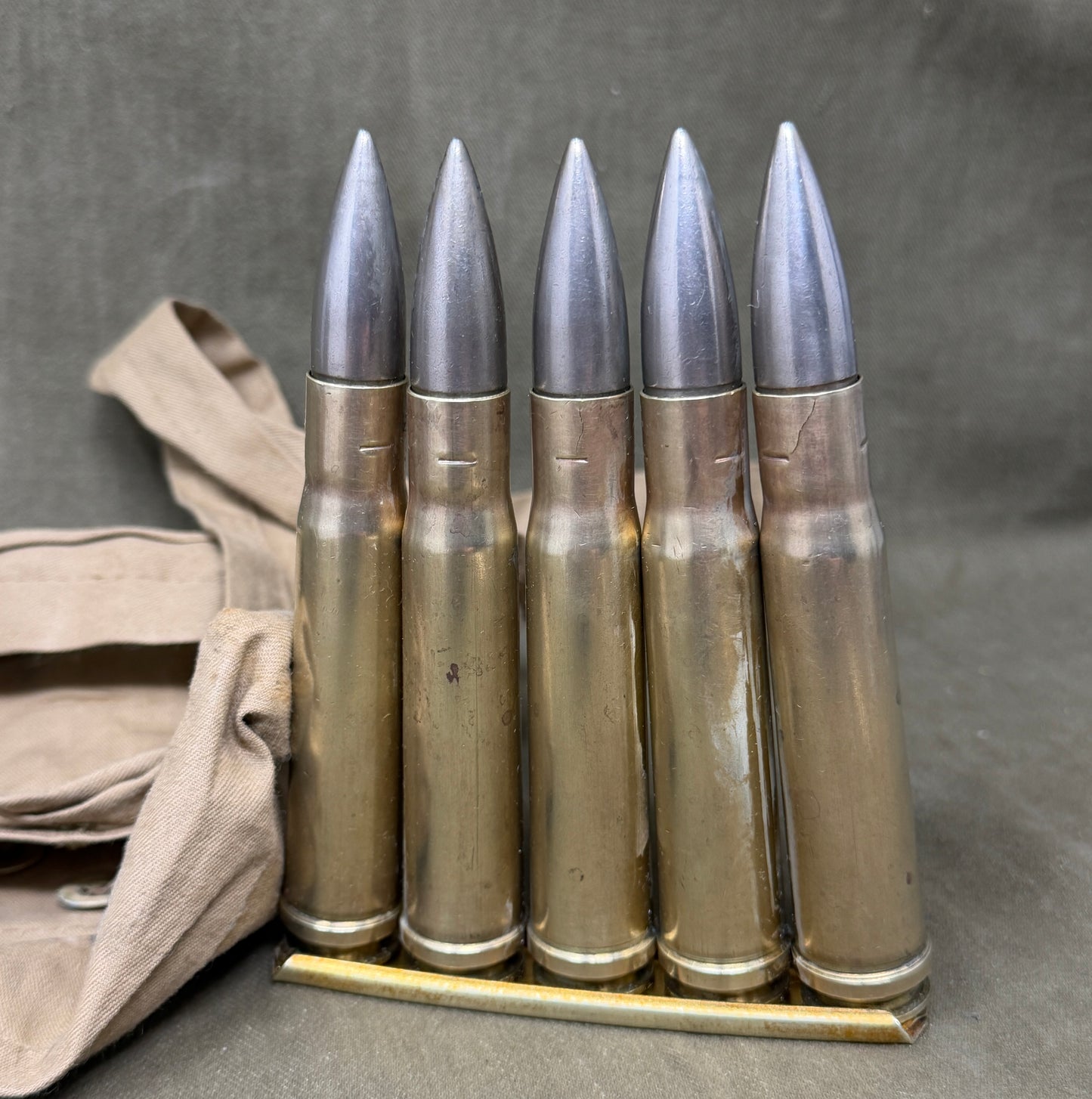WW2 .55 Boys Anti-Tank Rounds on Clips in Original 1942 Cloth Carry Case – K42 Headstamps (10 Inert Rounds)