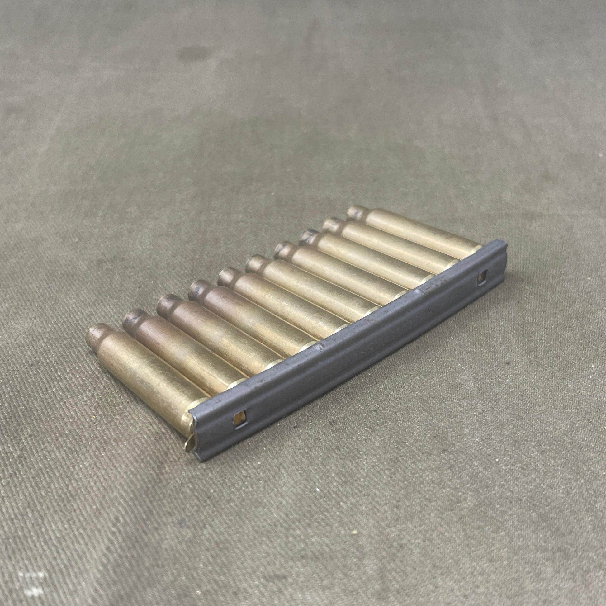 10 x INERT 5.56mm Cartridges Cases in Stripper Clip