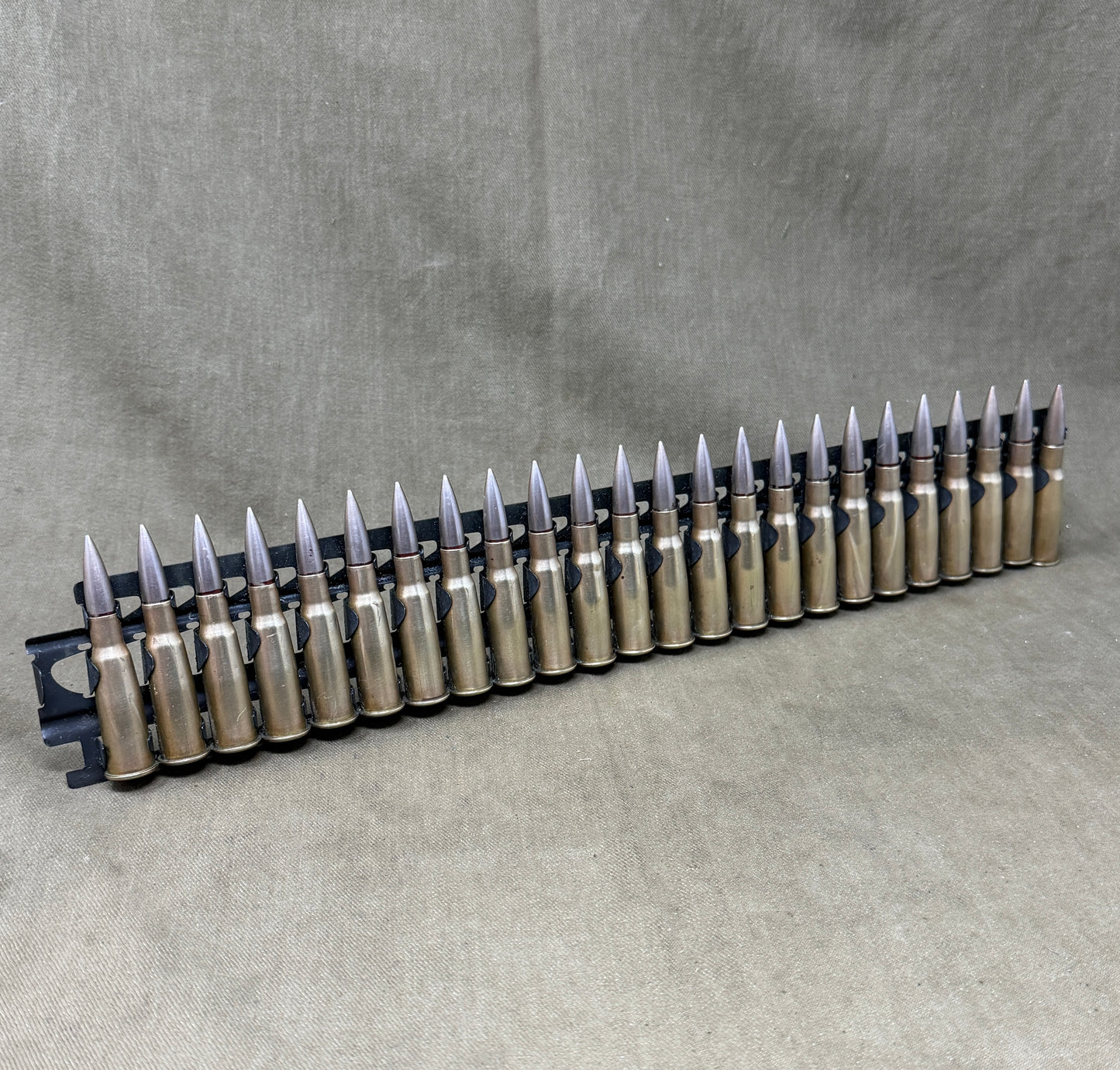30 × Inert French 8×50mmR Lebel 1948 Rounds on Original 30-Round Hotchkiss Strip – Oil Injected Display Set