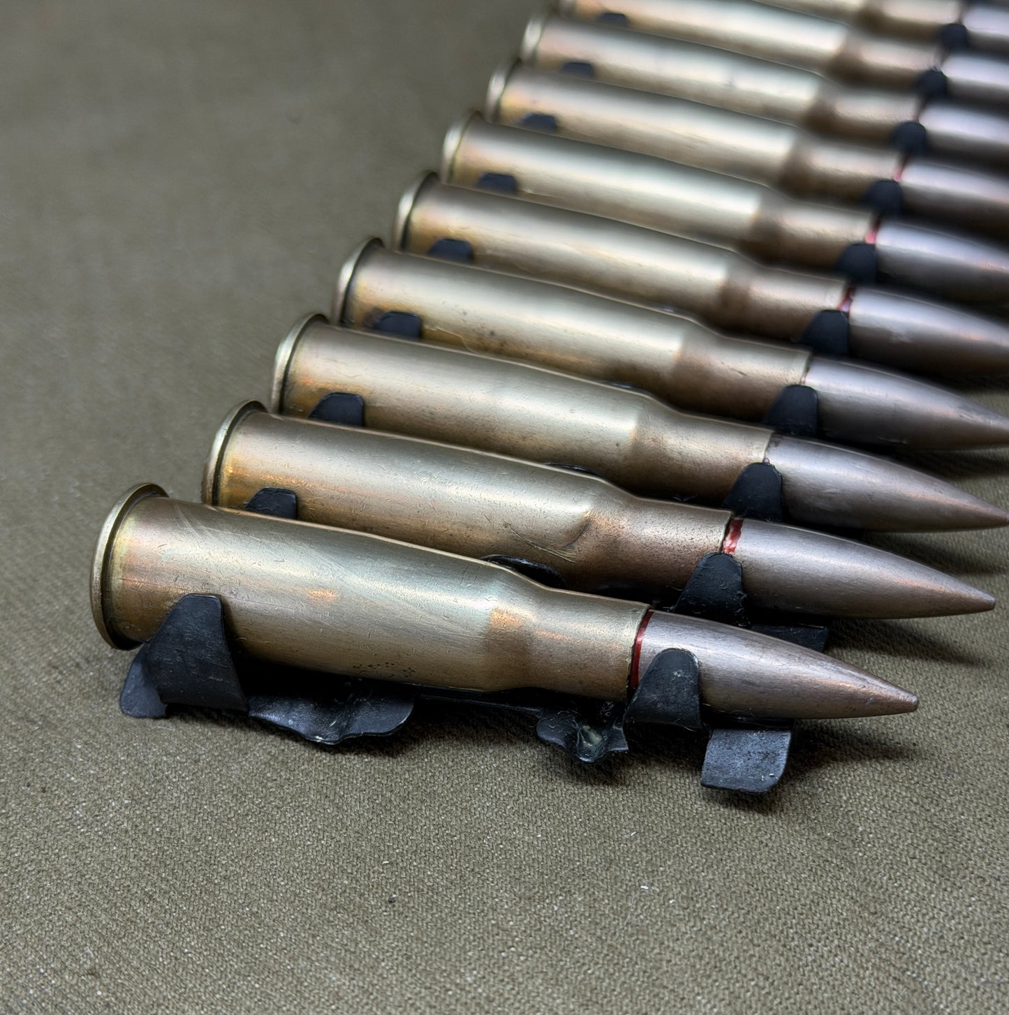 30 × Inert French 8×50mmR Lebel 1948 Rounds on Original 30-Round Hotchkiss Strip – Oil Injected Display Set