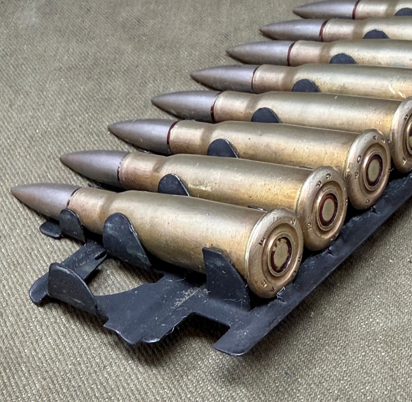 30 × Inert French 8×50mmR Lebel 1948 Rounds on Original 30-Round Hotchkiss Strip – Oil Injected Display Set