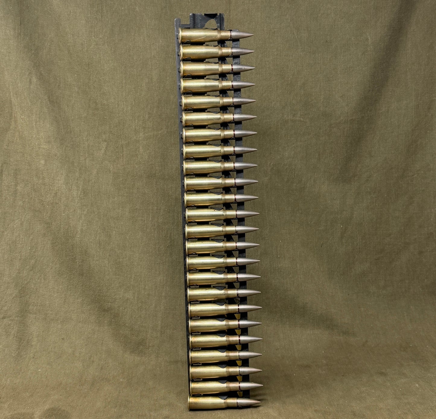 30 × Inert French 8×50mmR Lebel 1948 Rounds on Original 30-Round Hotchkiss Strip – Oil Injected Display Set