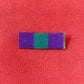 The King George VI General Service Medal (GSM) 1918-1962 ribbon is purple with a central green stripe