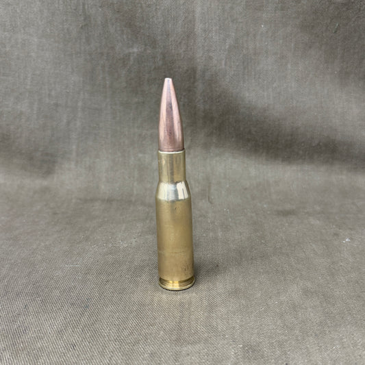 An Inert British .50 Cal Spotter round for 120mm Wombat