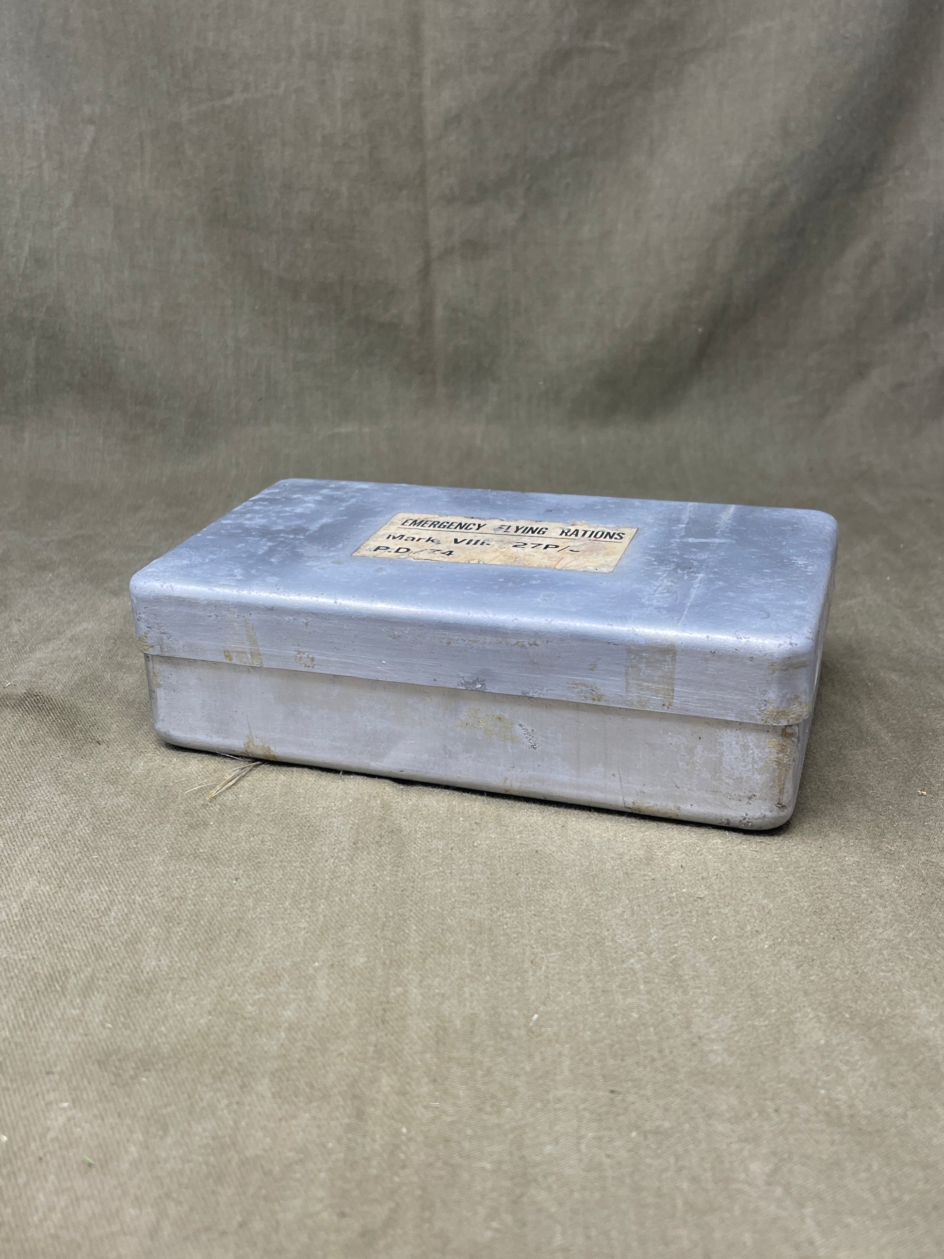 Shop a complete Royal Air Force Mark VIII Emergency Flying Rations tin (27P P.D/74). Rare WW2 survival kit issued to RAF aircrew—perfect for collectors.

