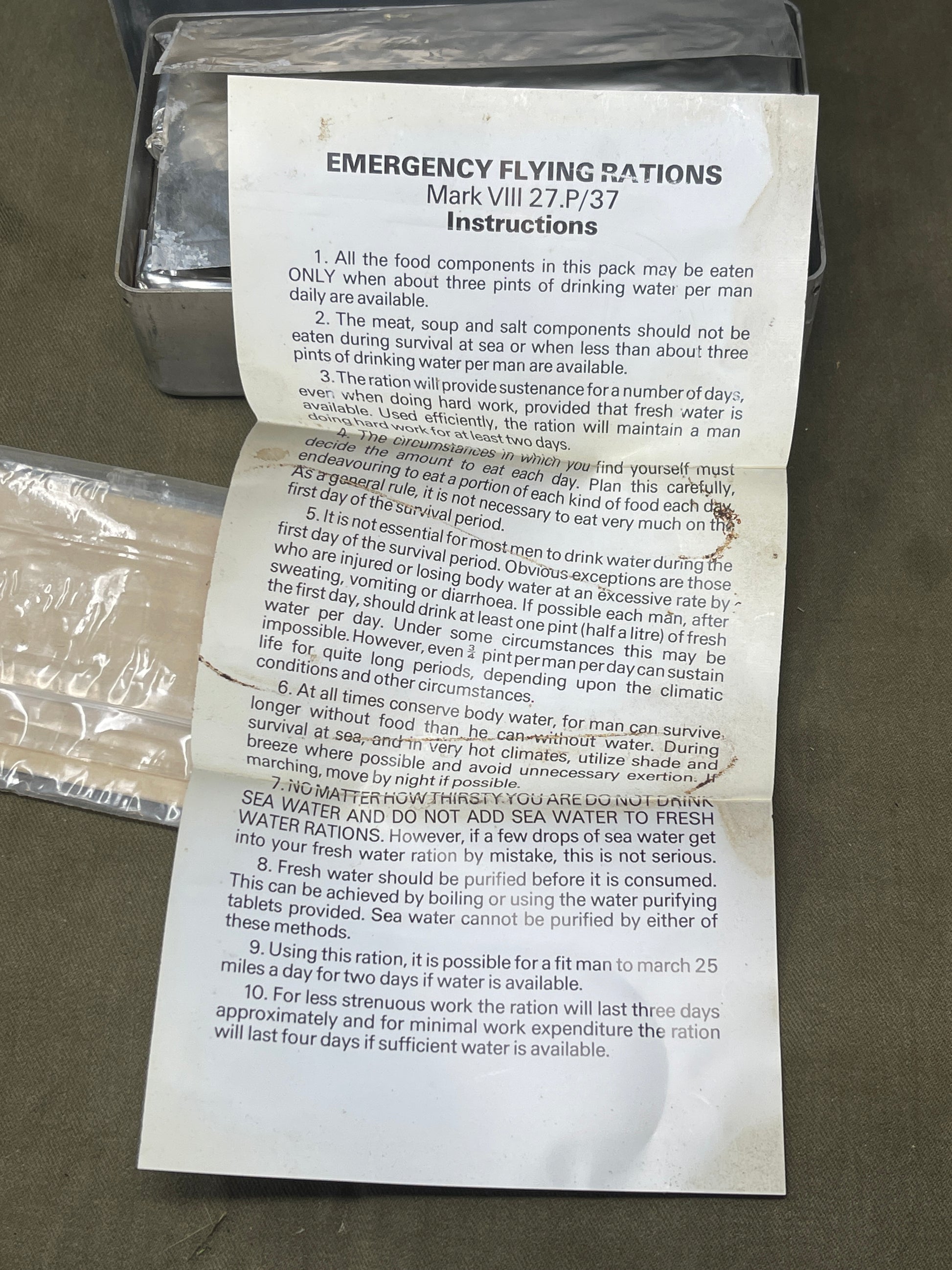 Shop a complete Royal Air Force Mark VIII Emergency Flying Rations tin (27P P.D/74). Rare WW2 survival kit issued to RAF aircrew—perfect for collectors.

