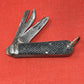 A nice example of a British Jack Knife, dated 1940  The blades are in good condition, the chequered Bakelite grip is intact and all the blades lock and close as they should. The steel can opener is in good condition