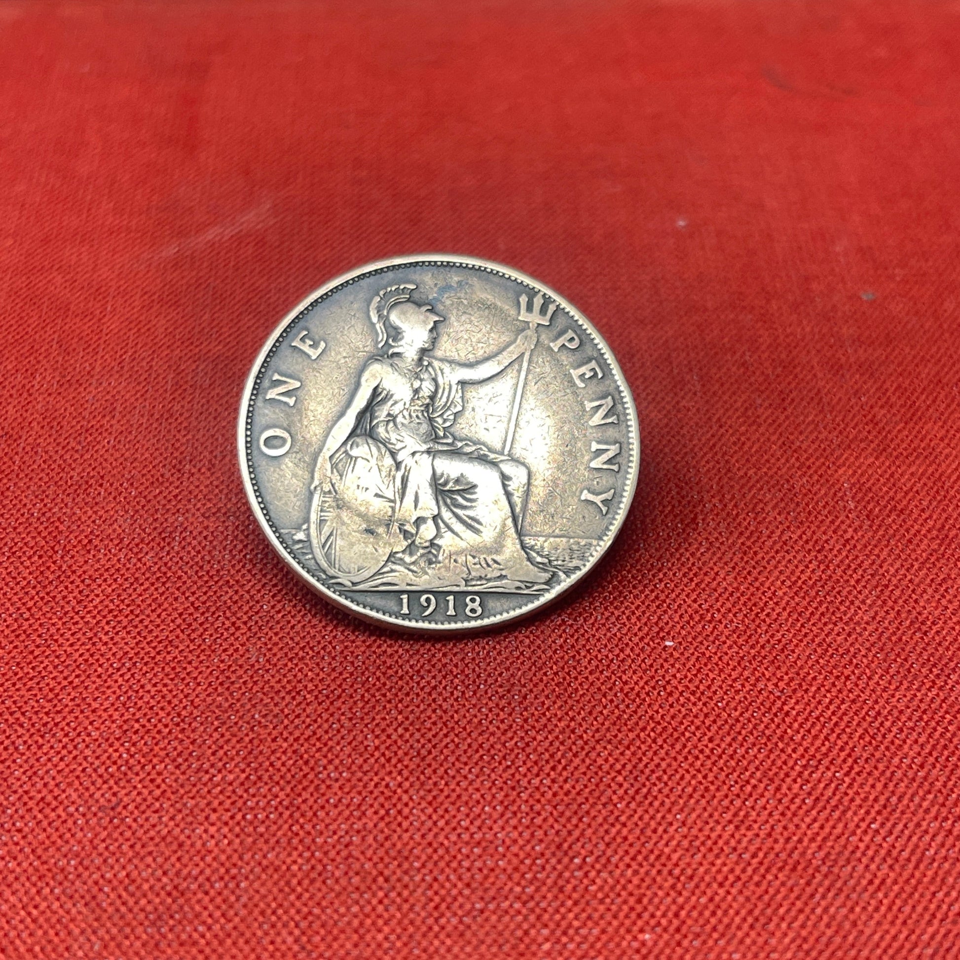 Explore the history and collectability of the King George V One Penny dated 1936. Perfect for numismatists and history enthusiasts seeking an authentic piece of British coinage.