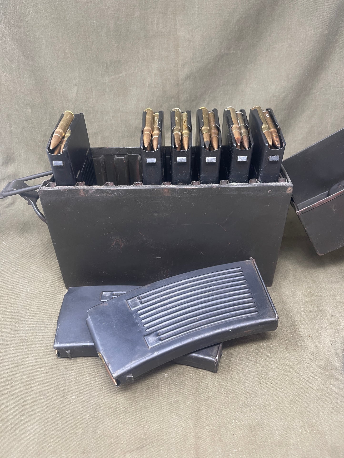 Authentic WW2 German MG13 magazine ammo box with 8 original MG13 magazines and 5 inert 7.92mm rounds. All items stamped with Waffenamt and dates. Excellent condition.